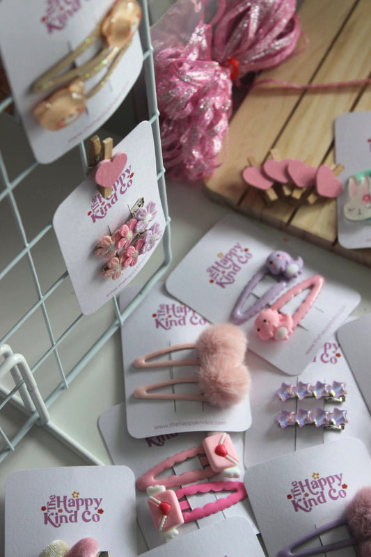 Blush Pom Pom Snap Clips