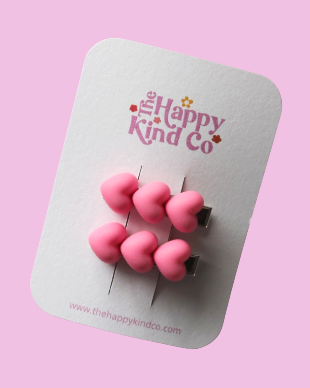 Triple Magenta Heart Clips
