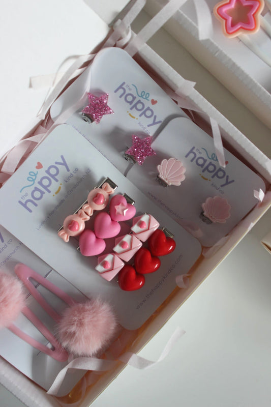 Blush Pom Pom Snap Clips